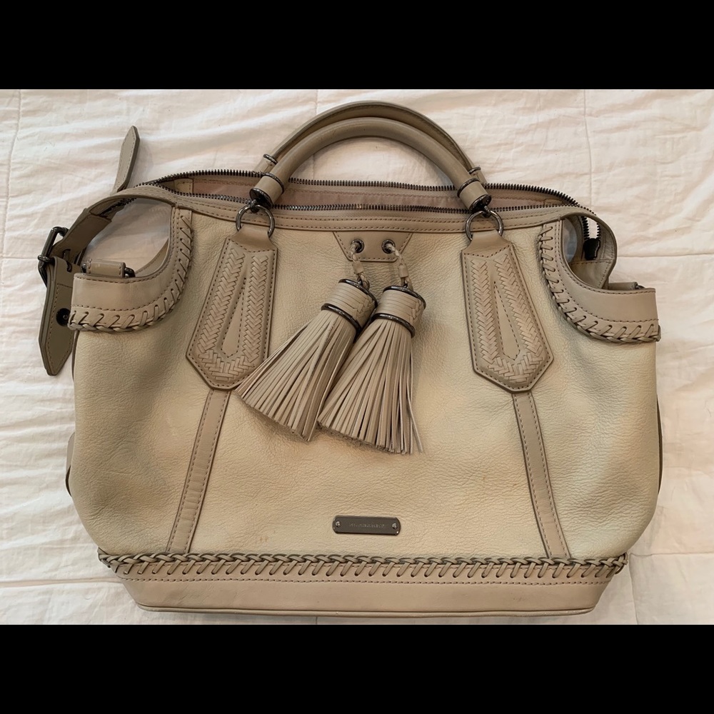 Burberry leather purse w/ leather tassels .